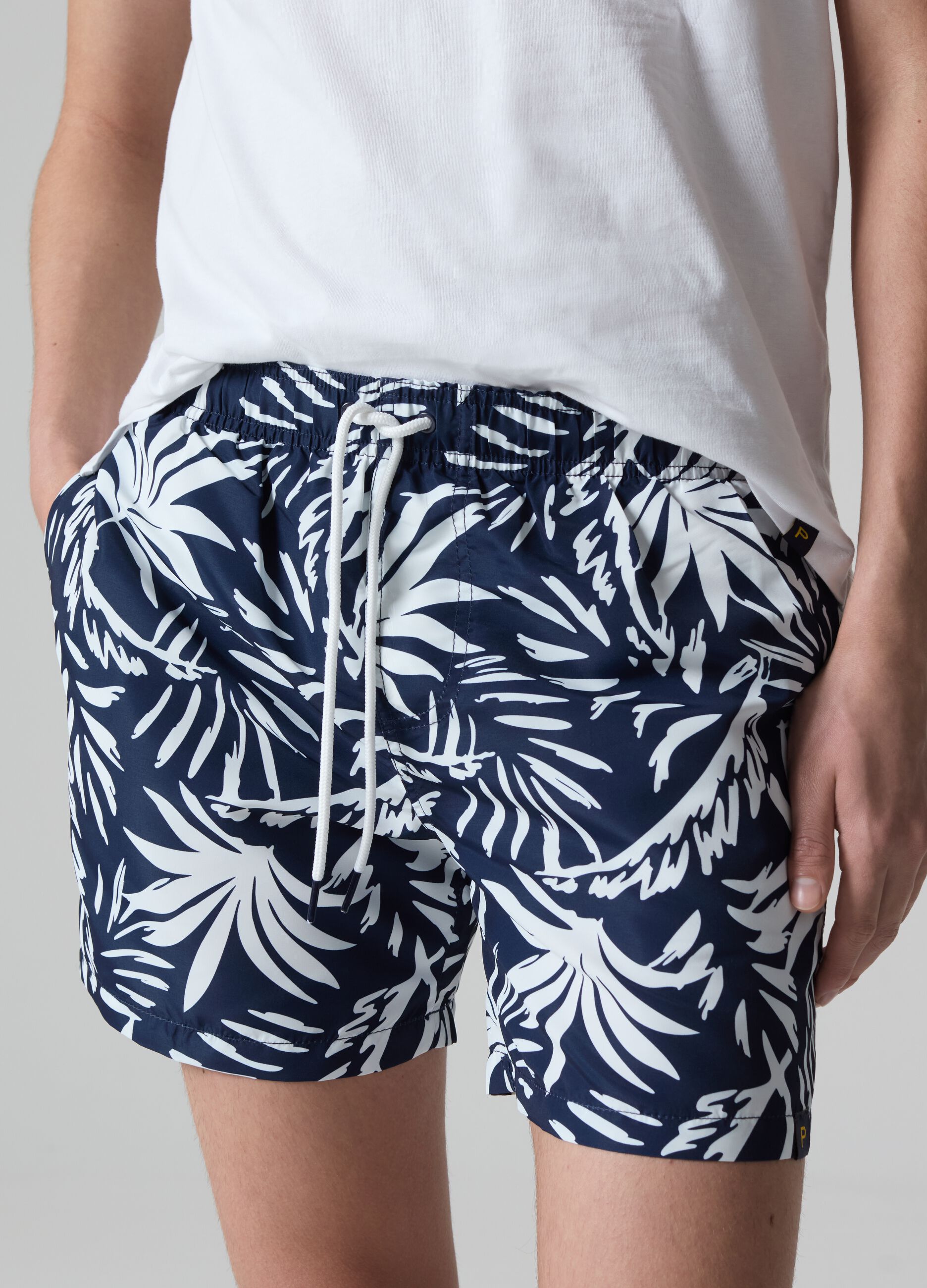 Bermuda swim shorts with foliage print_0