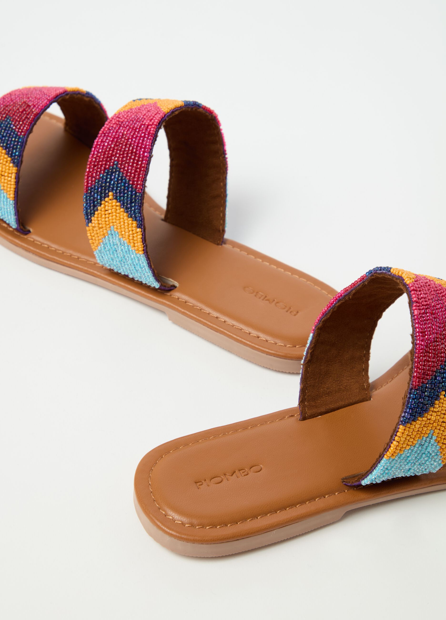 Double-banded sandals with beads