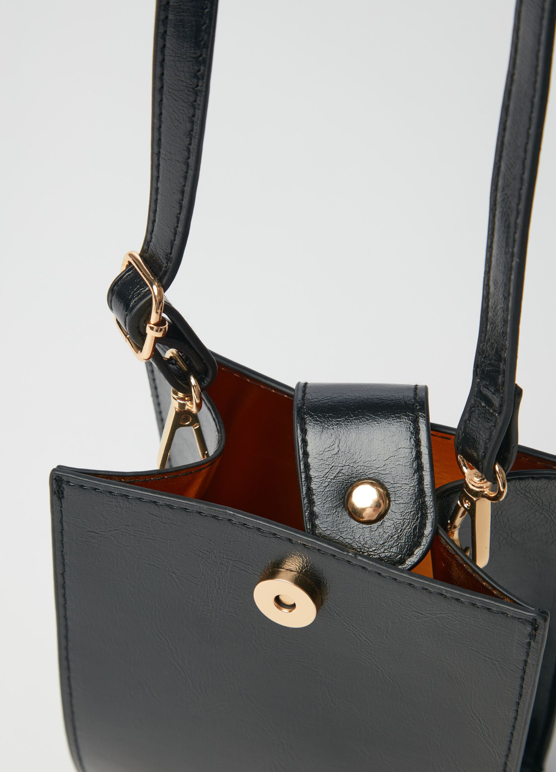 Squared bag with shoulder strap