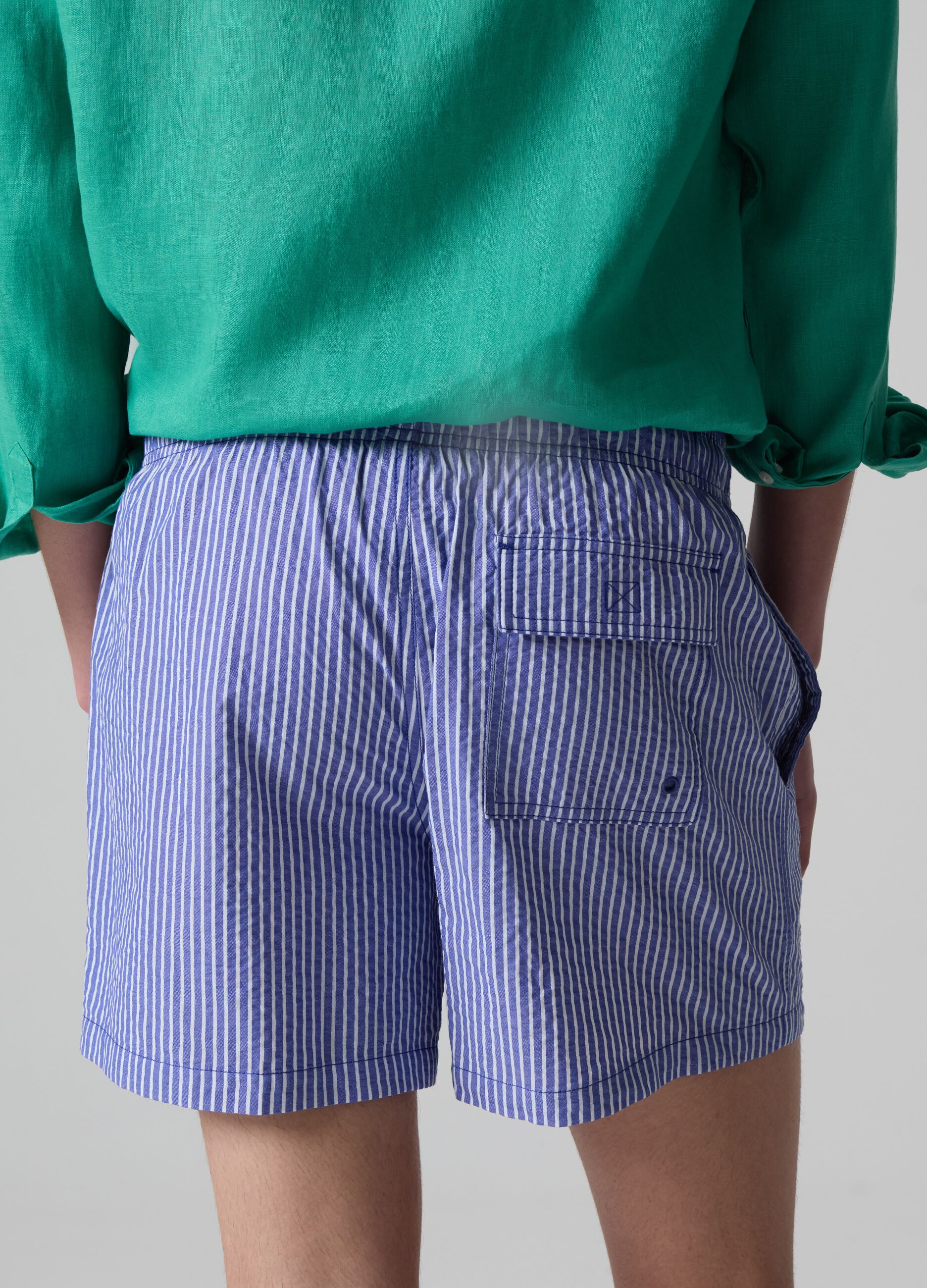 Bermuda swim shorts in striped seersucker