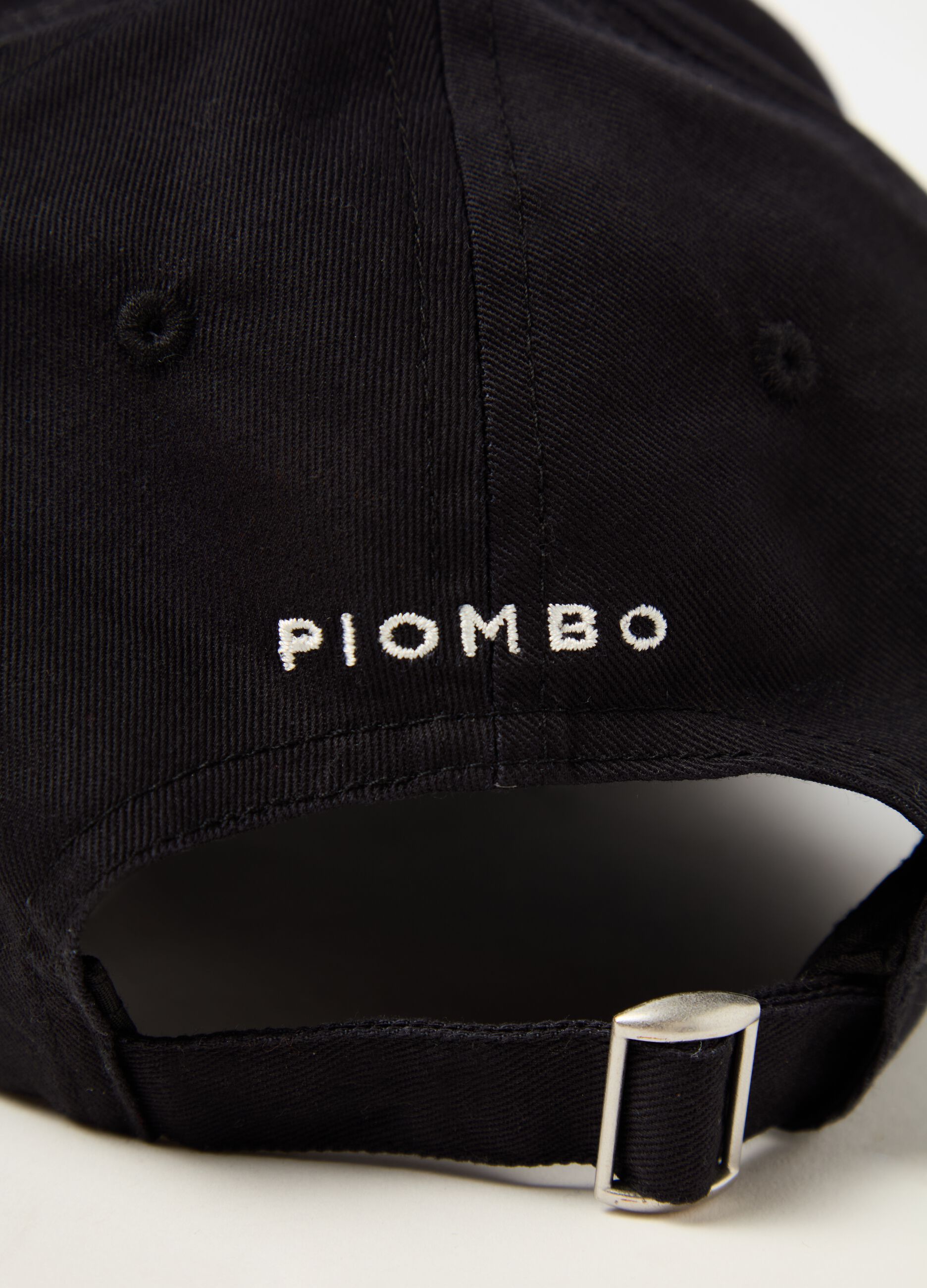 Baseball cap with embroidered logo