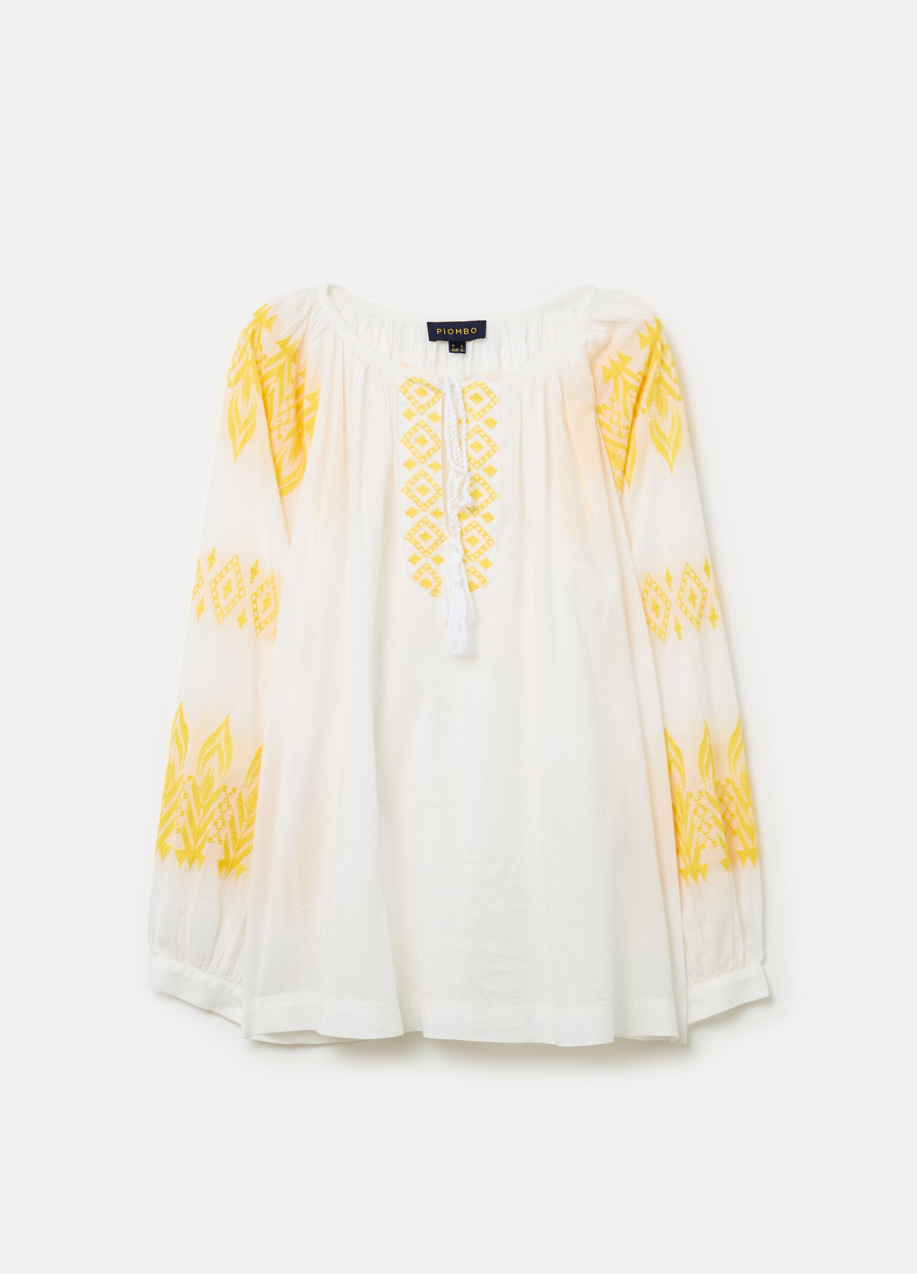 Oversized blouse with ethnic embroidery and tassels