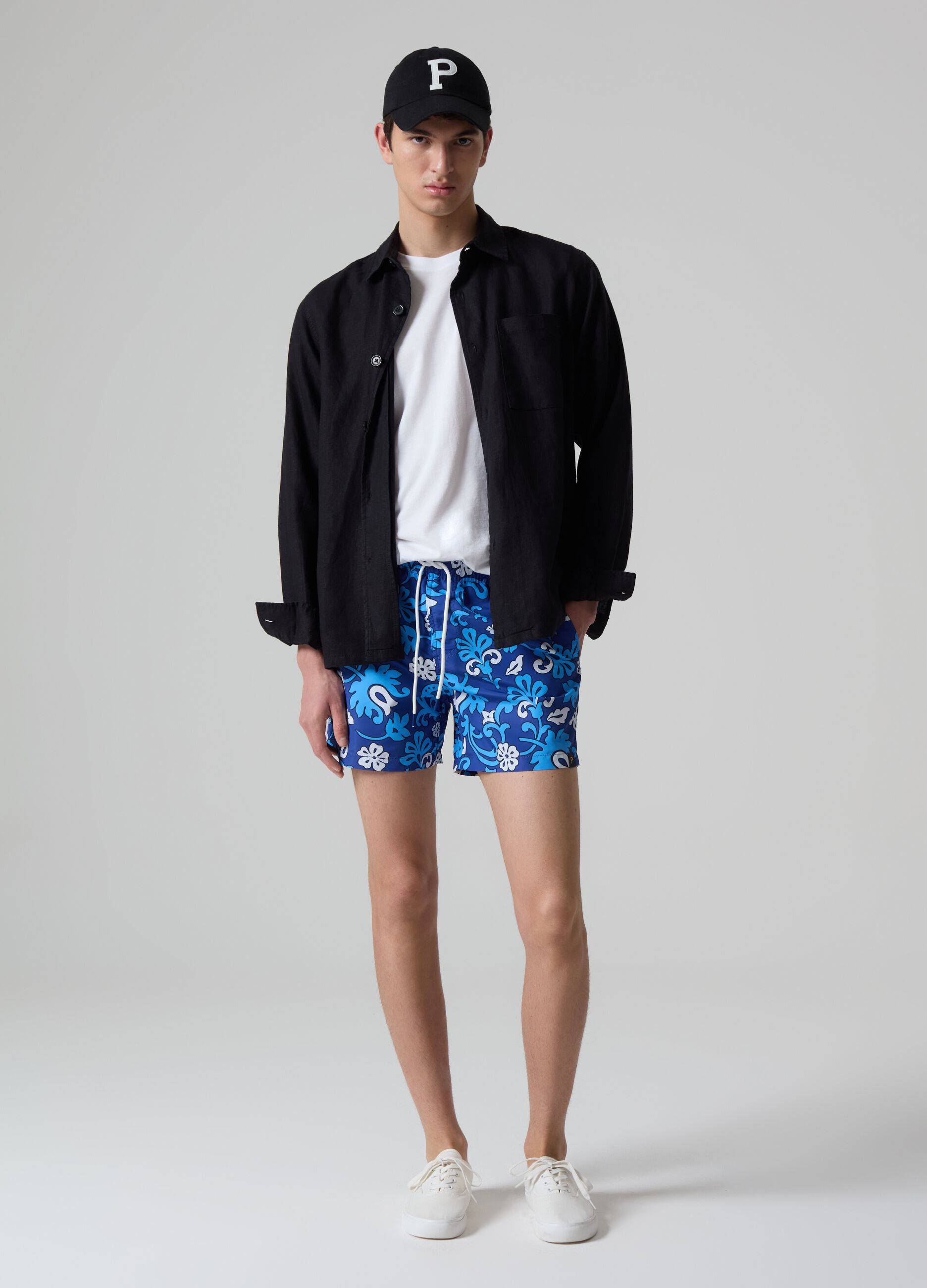 Bermuda swim shorts with floral print