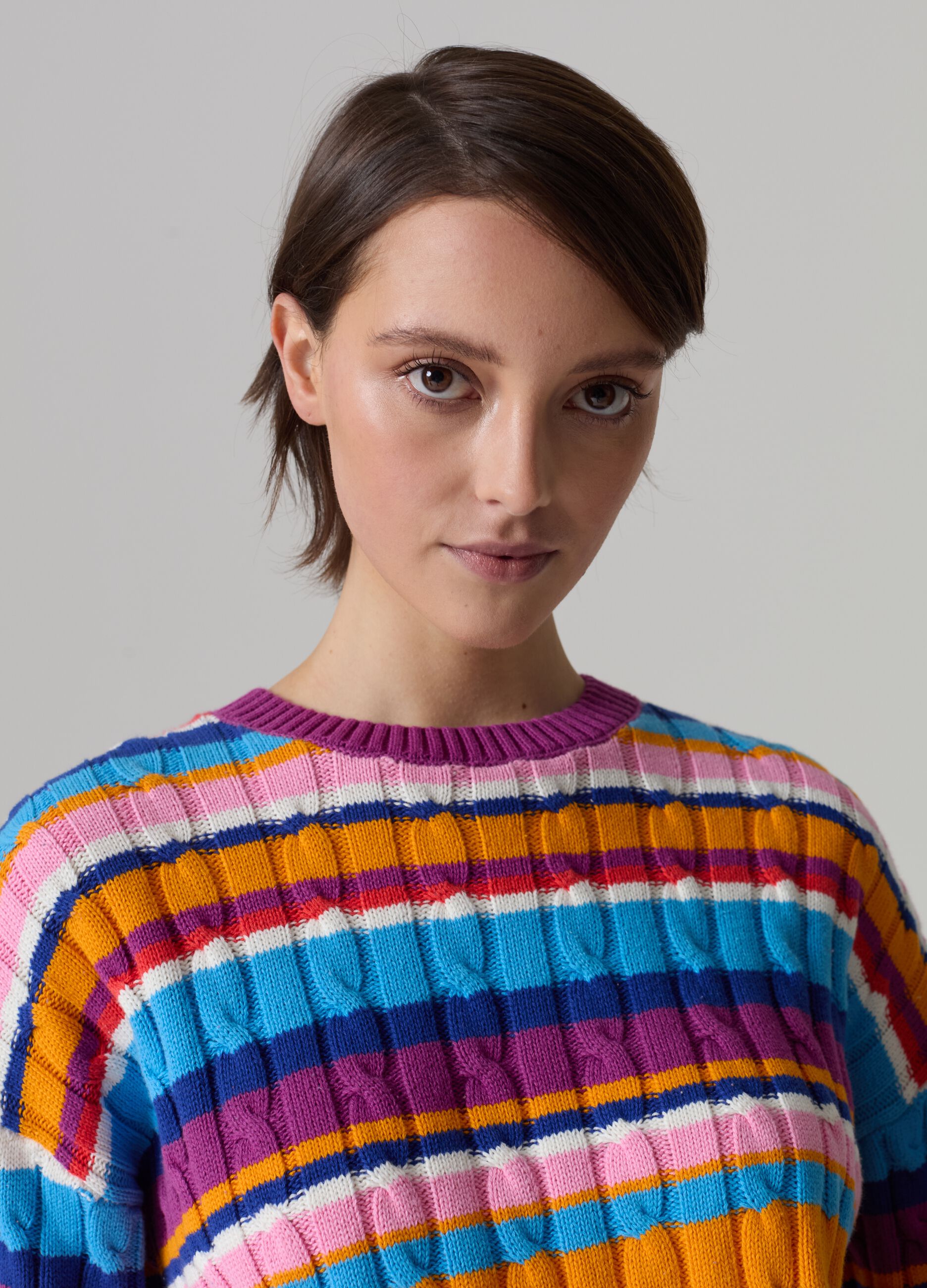 Striped pullover with cable-knit design_0