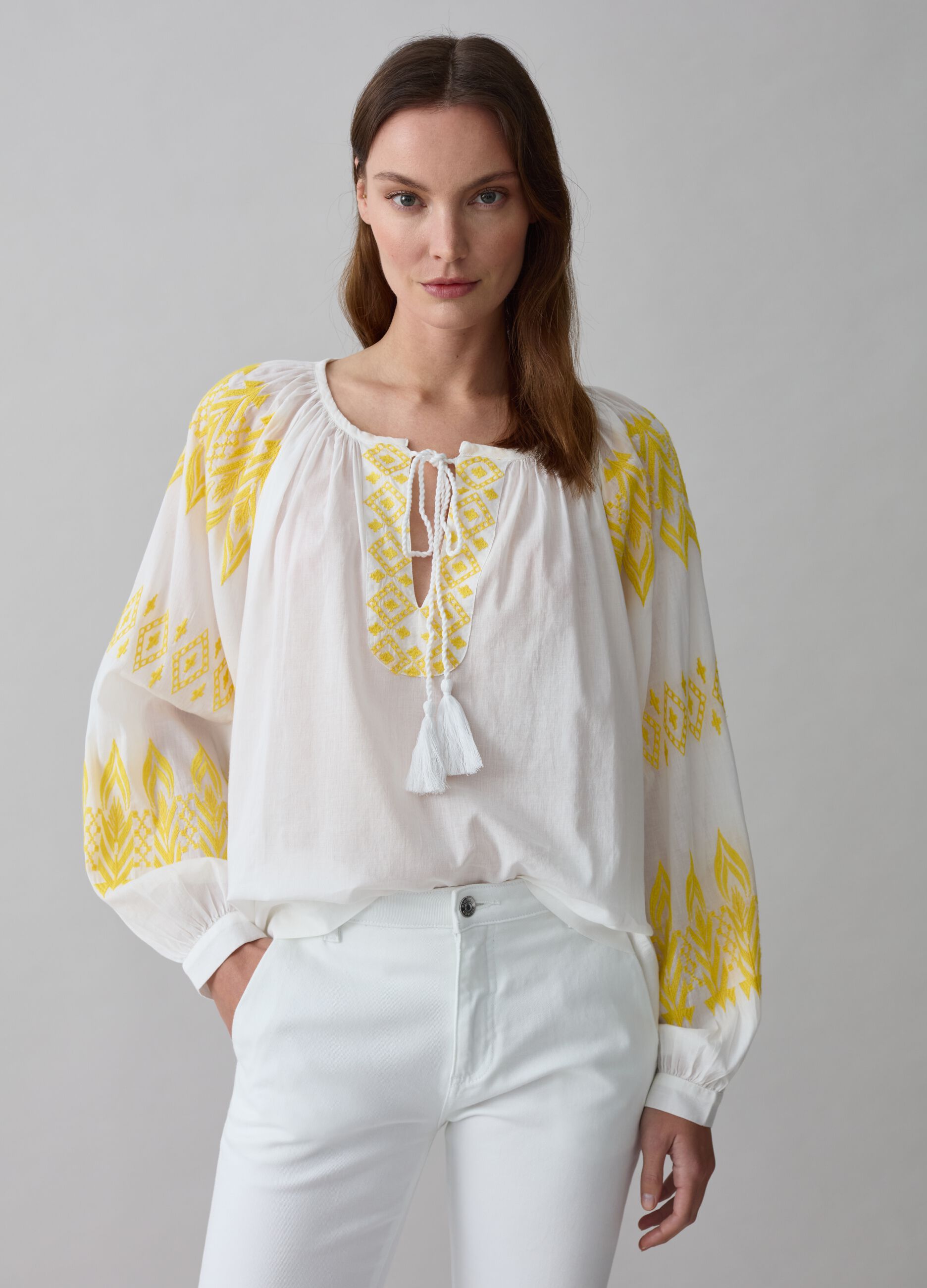 Oversized blouse with ethnic embroidery and tassels