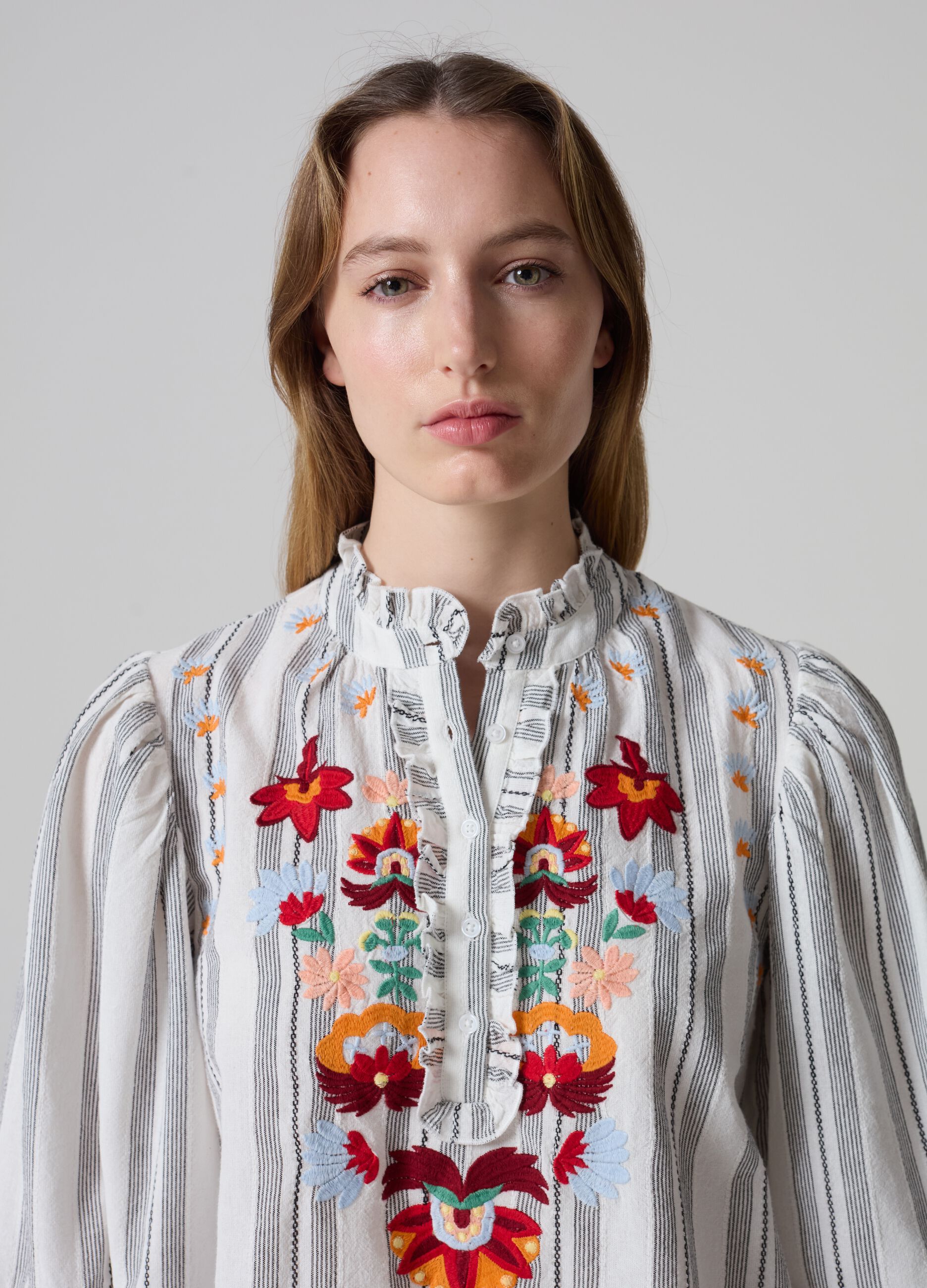 Striped blouse with flowers embroidery