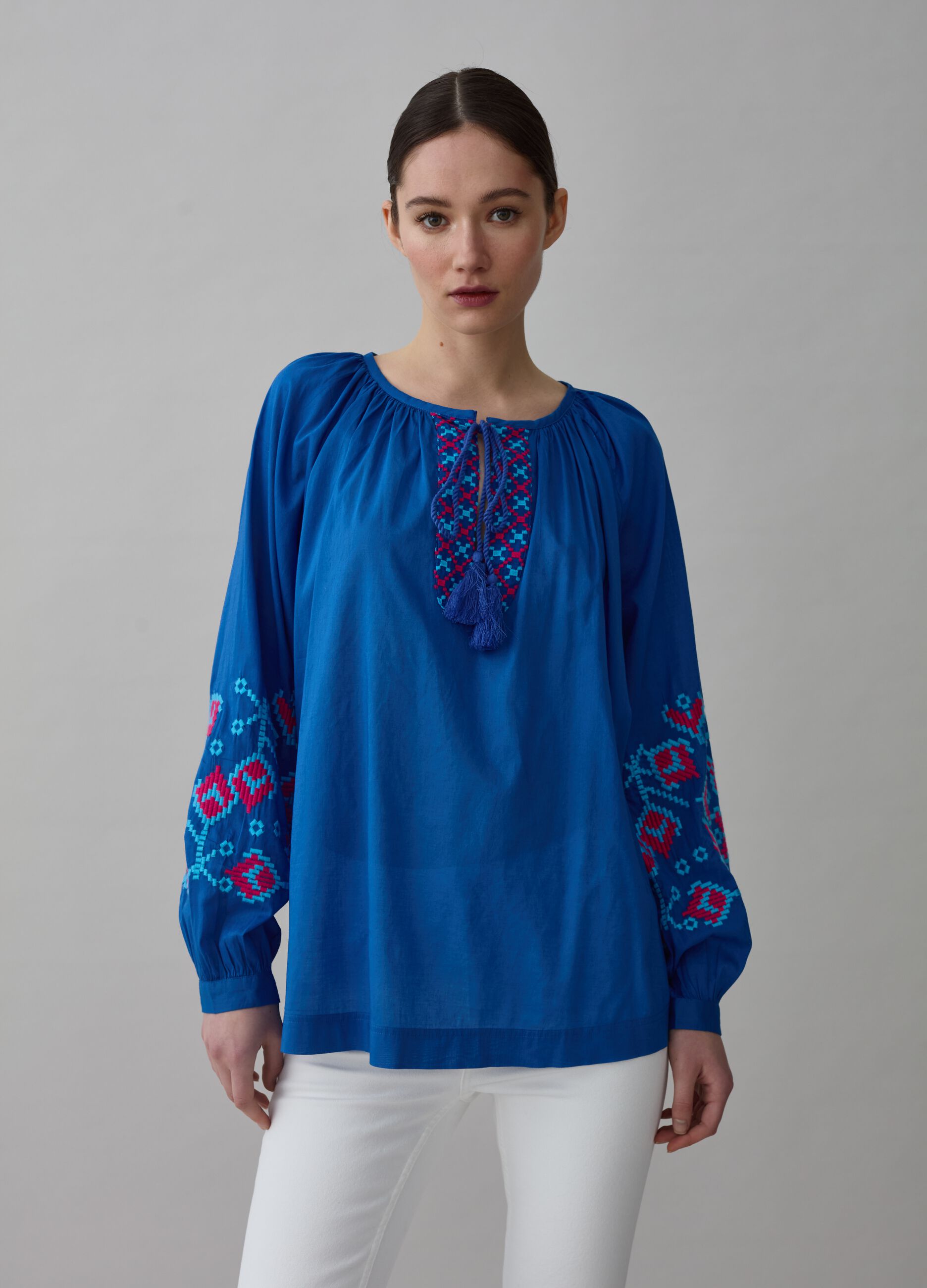 Oversized blouse with ethnic embroidery and tassels