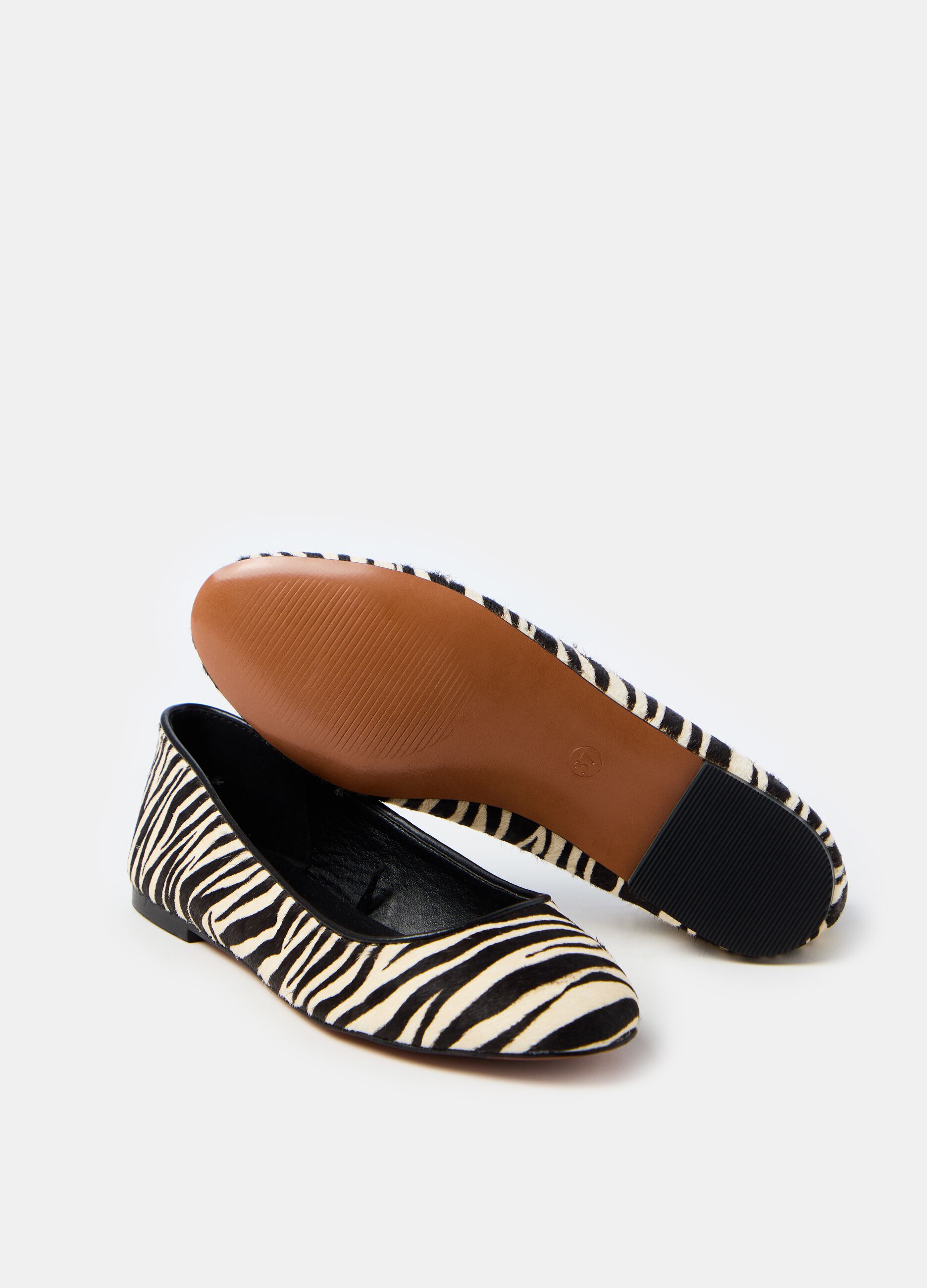 Ballerina flats with zebra pattern