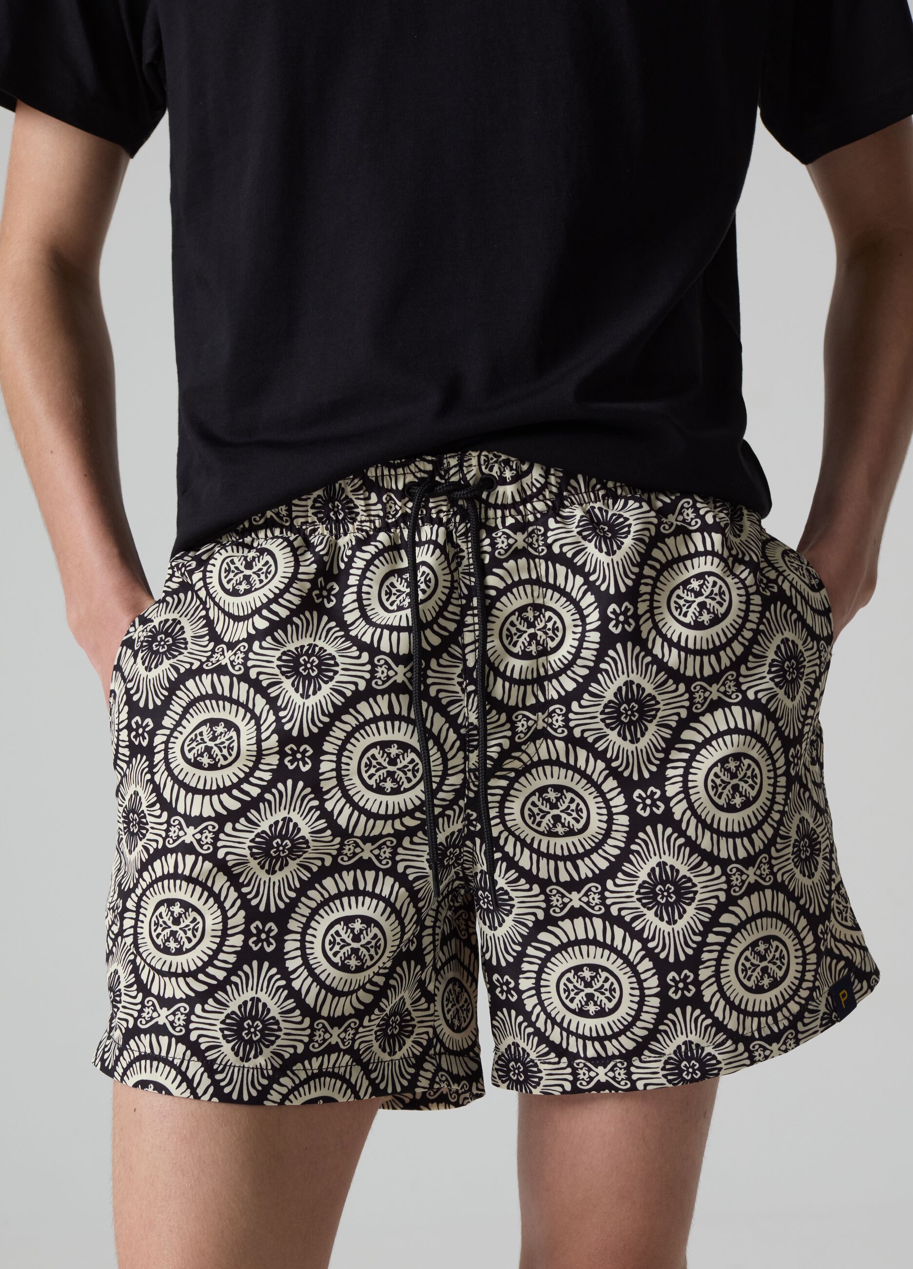 Bermuda swim shorts with Inca print_1