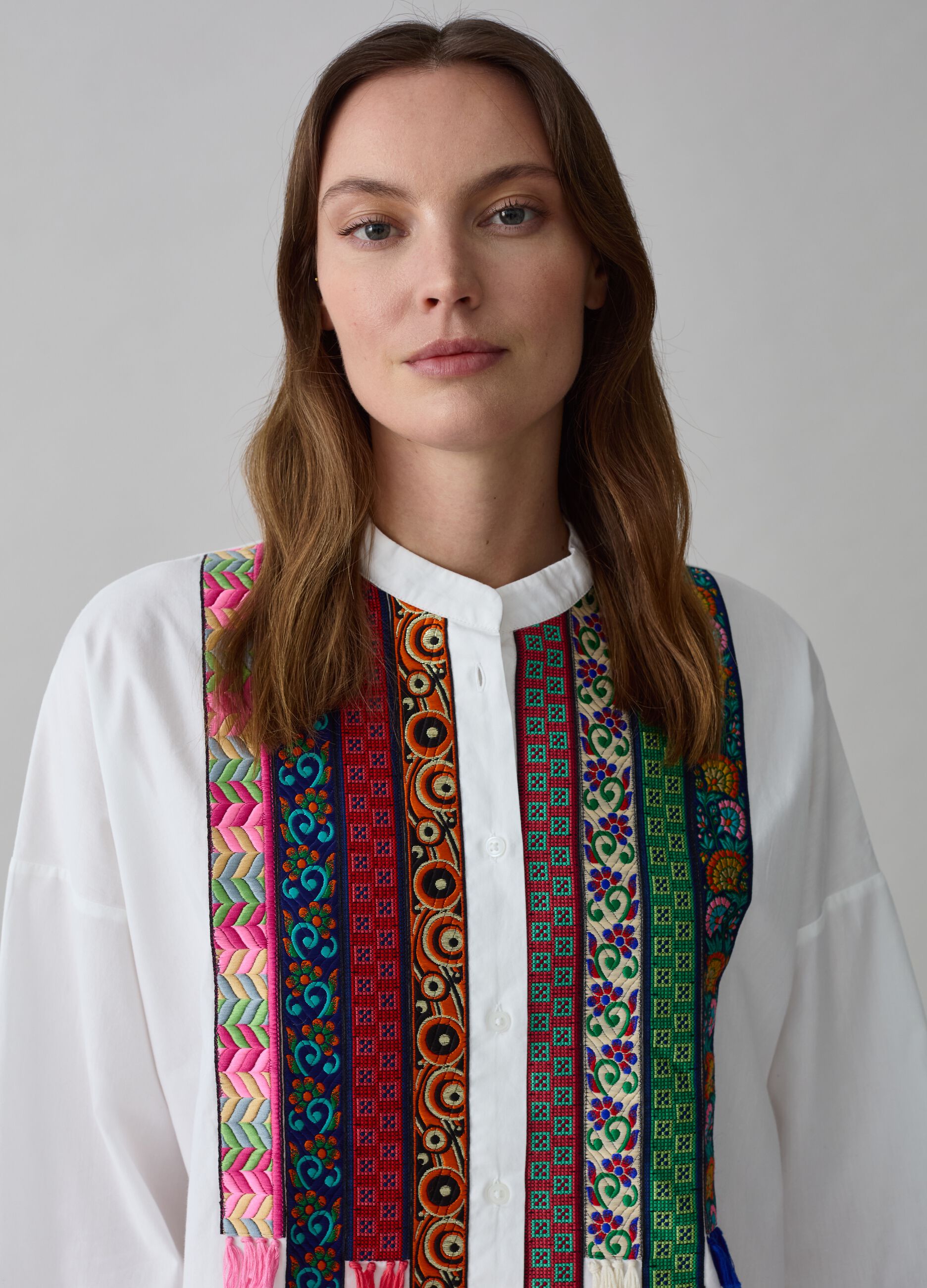 Blouse with ethnic embroidery and tassels