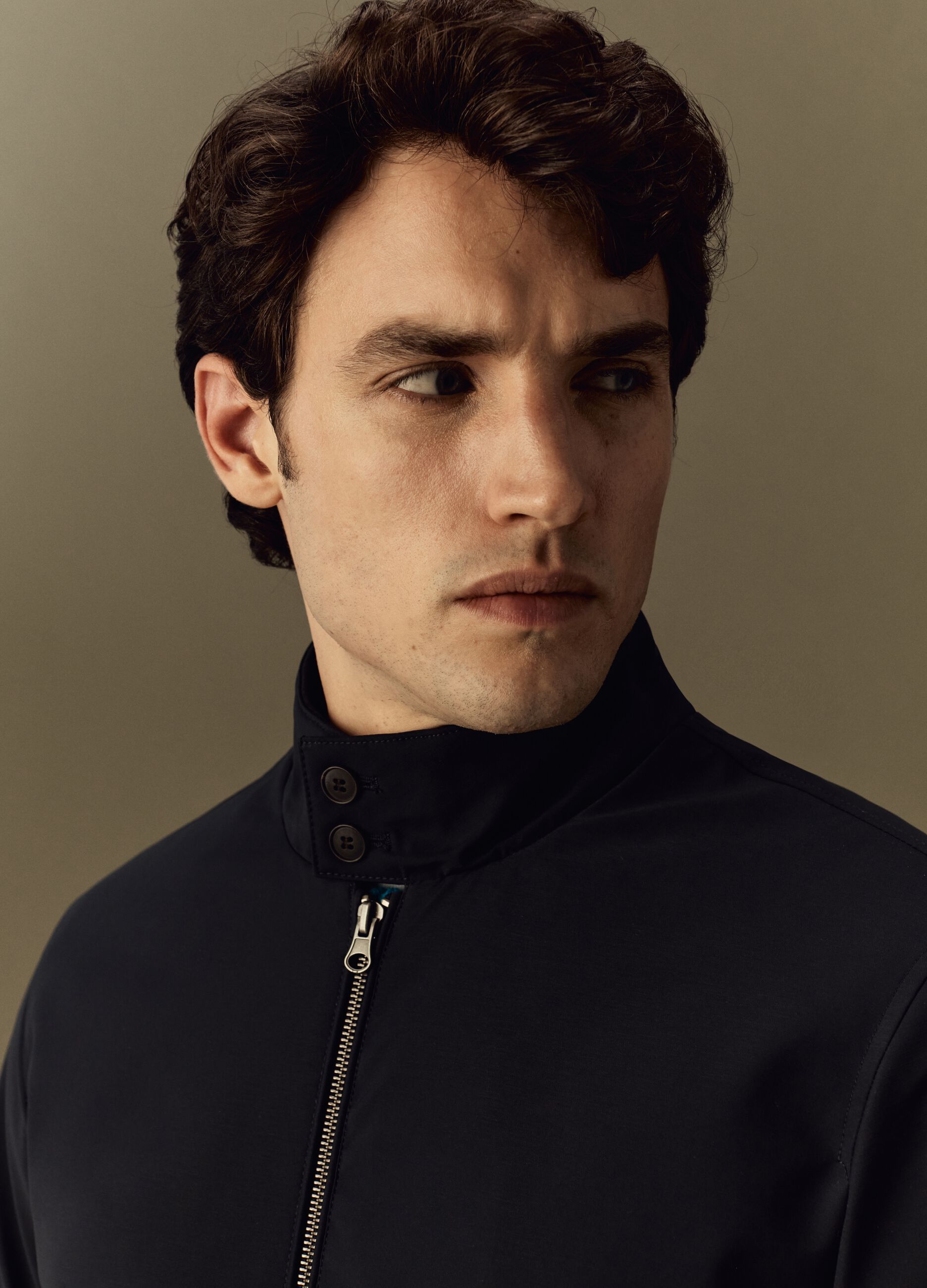 Full-zip bomber jacket with buttons on the neck