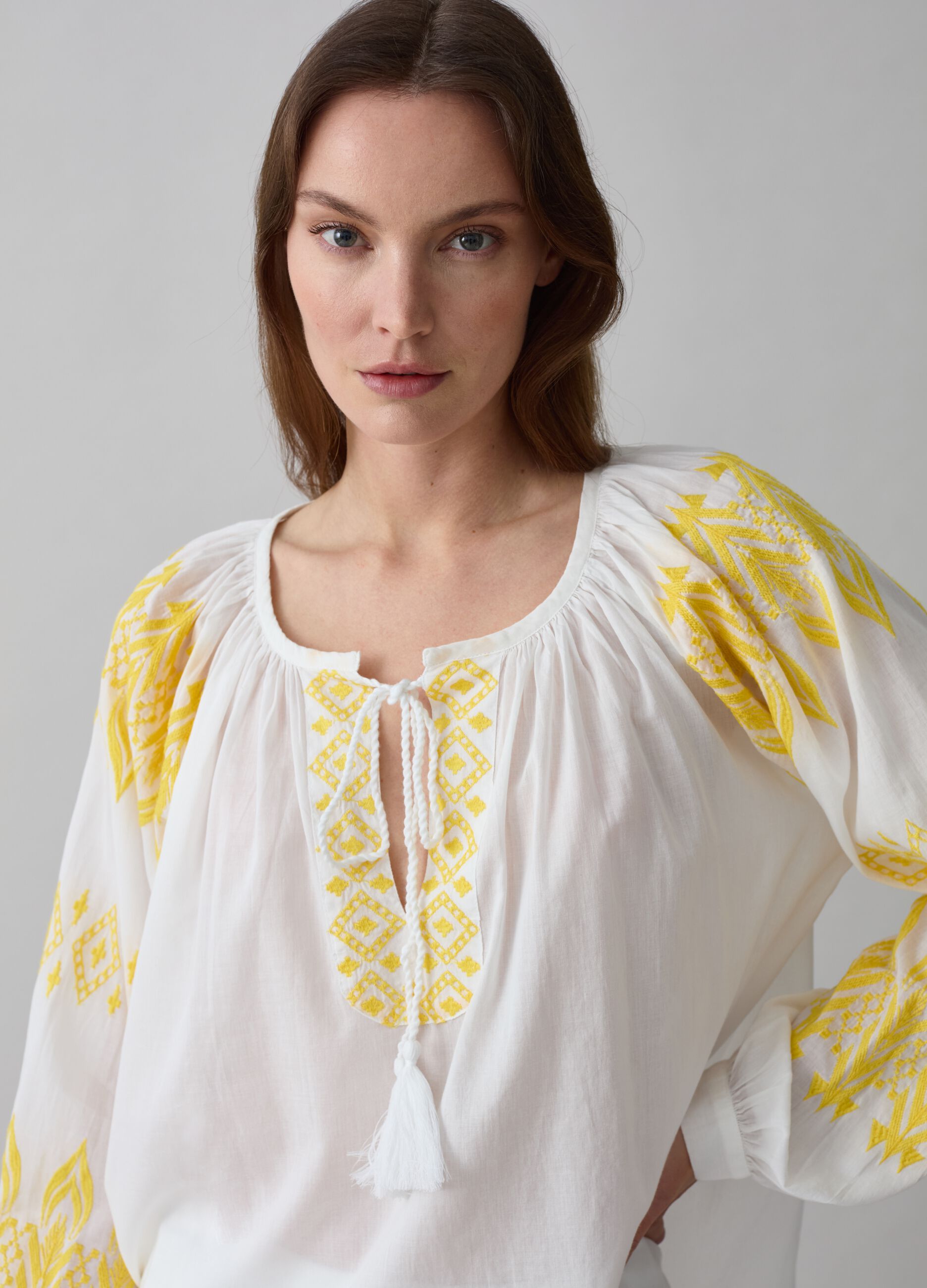 Oversized blouse with ethnic embroidery and tassels